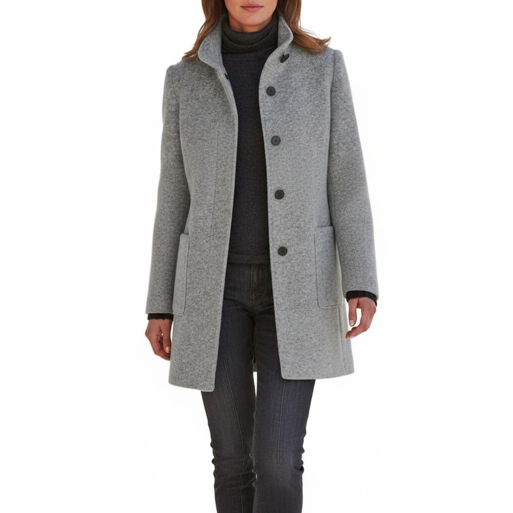 Klasyczny i stylowy wełniany płaszcz typu trencz z zapięciem na guziki w stylu retro